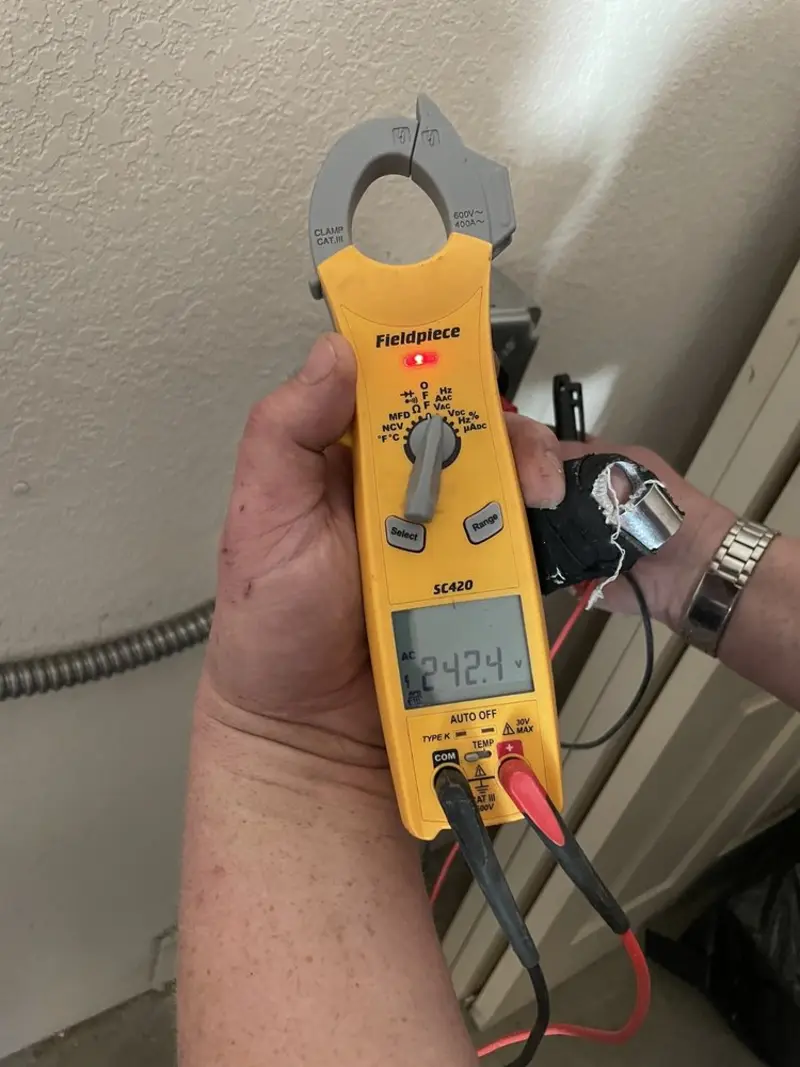 Voltage testing with clamp meter during Aluminum Wiring Replacement in Mitchell
